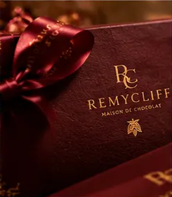 A close look at the burgundy and gold Remycliff packaging