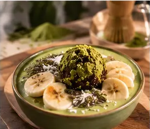 A PURE protein bite on a matcha smoothie bowl