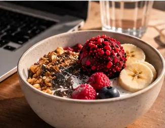 A PURE protein bite on a breakfast bowl