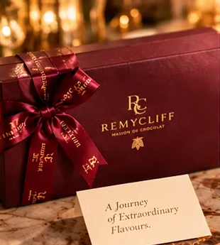 The Remycliff gift box with its 'A Journey of Extraordinary Flavours' card